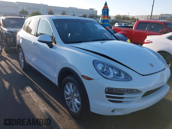 2014 Porsche Cayenne with VIN WP1AA2A28ELA96123, listed as a IAAI auction lot 42010456 with 154,312 mi miles and . Bid and sale history available at DreamBid. Image 1.