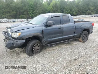 2010 Toyota Tundra z VIN 5TFUW5F15AX101377, wystawiony jako Copart lot #55348565 z przebiegiem 182 147 mil mil oraz Szkody całkowita. Historia ofert i sprzedaży dostępna na DreamBid. Obrazek 1.