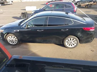2016 Kia Optima EX with VIN 5XXGU4L37GG119415, listed as a IAAI auction lot 41242191 with 92,657 mi miles. Bid and sale history available at carsss.com. Image 14.