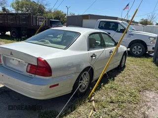 2000 Mitsubishi Diamante LS with VIN 6MMAP67P4YT001142, listed as a Copart auction lot 49667135 with 243,861 mi miles and Clean Title. Bid and sale history available at carsss.com. Image 4.