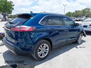 2020 Ford Edge SEL z VIN 2FMPK3J94LBB45306, wystawiony jako IAAI lot #39398218 z przebiegiem 59 807 mil mil oraz . Historia ofert i sprzedaży dostępna na DreamBid. Obrazek 4.