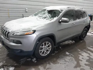 2014 Jeep Cherokee Latitude with VIN 1C4PJMCS9EW124434, listed as a IAAI auction lot 41582319 with 123,372 mi miles. Bid and sale history available at carsss.com. Image 17.