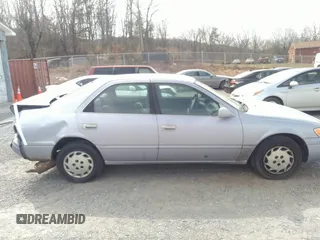 1997 Toyota Camry LE z VIN 4T1BG22K8VU108750, wystawiony jako IAAI lot #41706625 z przebiegiem 296 386 mil mil oraz . Historia ofert i sprzedaży dostępna na DreamBid. Obrazek 14.