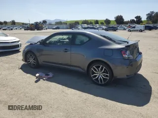 2014 Scion tC with VIN JTKJF5C7XE3085579, listed as a Copart auction lot 52431165 with 44,421 mi miles and Salvage Title. Bid and sale history available at carsss.com. Image 2.
