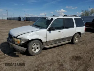 2000 Ford Explorer XLT z VIN 1FMZU83PXYZA71034, wystawiony jako Copart lot #55447585 z przebiegiem 175 118 mil mil oraz Szkody całkowita. Historia ofert i sprzedaży dostępna na DreamBid. Obrazek 1.
