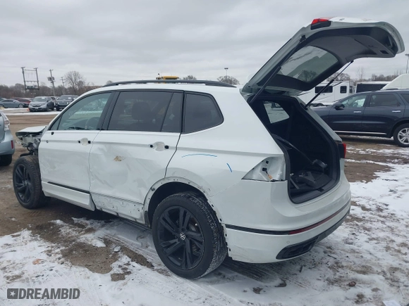 2023 Volkswagen Tiguan SE R-Line Black with VIN 3VVCB7AX6PM132085, listed as a IAAI auction lot 41278065 with 24,333 mi miles. Bid and sale history available at carsss.com. Image 3.