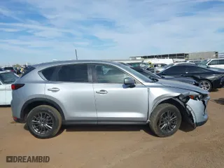 2020 Mazda CX-5 Touring with VIN JM3KFACM0L0772635, listed as a IAAI auction lot 41635115 with 120,285 mi miles. Bid and sale history available at carsss.com. Image 13.