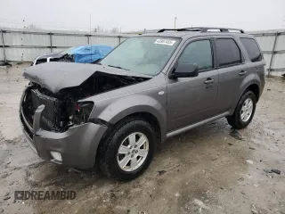 2009 Mercury Mariner with VIN 4M2CU81G39KJ17532, listed as a Copart auction lot 43907455 with 214,212 mi miles and Salvage title. Bid and sale history available at DreamBid. Image 1.