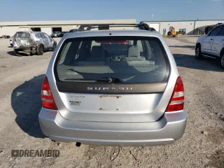 2005 Subaru Forester XS с VIN JF1SG65665H733429, выставлен на аукционе Copart как лот 52937625 с пробегом 157 613 миль миль и Списание • Salvage title. История ставок и продаж доступна на DreamBid. Изображение 6.