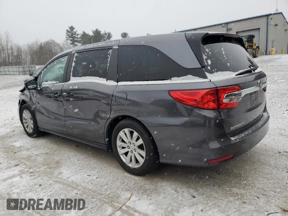 2018 Honda Odyssey LX with VIN 5FNRL6H28JB013928, listed as a Copart auction lot 87695025 with 194,390 mi miles and Salvage Title. Bid and sale history available at carsss.com. Image 2.