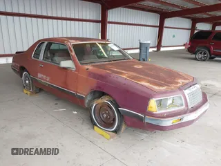 1984 Ford Thunderbird with VIN 1FABP4630EA111572, listed as a IAAI auction lot 41569309 with 7,919 mi miles and . Bid and sale history available at DreamBid. Image 1.