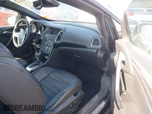 2016 Buick Cascada Premium with VIN W04WT3N53GG100841, listed as a IAAI auction lot 42050383 with 116,900 mi miles and . Bid and sale history available at DreamBid. Image 5.
