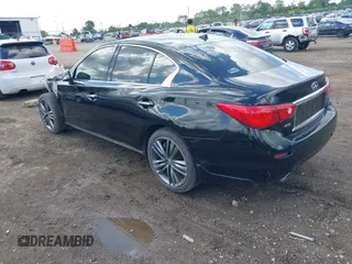 2014 Infiniti Q50 Premium with VIN JN1BV7AR0EM705304, listed as a IAAI auction lot 42619040 with 81,848 mi miles and . Bid and sale history available at DreamBid. Image 3.