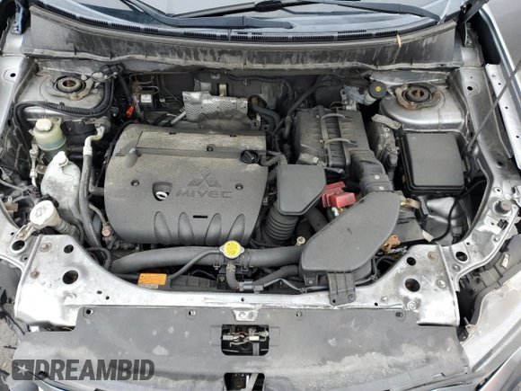 2013 Mitsubishi Outlander SE z VIN JA4JT3AW4DU000656, wystawiony jako Copart lot #51808395 z przebiegiem 158 479 mil mil oraz Szkoda całkowita • Salvage title. Historia ofert i sprzedaży dostępna na DreamBid. Obrazek 12.