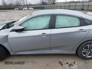2017 Honda Civic LX z VIN 2HGFC2F51HH562496, wystawiony jako IAAI lot #41524243 z przebiegiem Nie podano mil oraz . Historia ofert i sprzedaży dostępna na DreamBid. Obrazek 13.