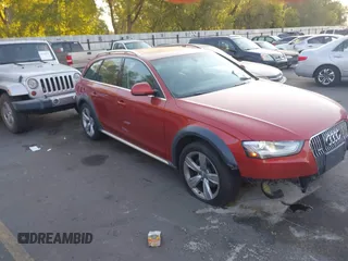2014 Audi allroad Premium Plus with VIN WA1UFAFL1EA069928, listed as a IAAI auction lot 40558283 with 138,316 mi miles. Bid and sale history available at carsss.com. Image 1.