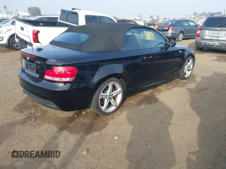 2010 BMW 1 Series 135i with VIN WBAUN9C54AVK41785, listed as a IAAI auction lot 41228825 with 60,817 mi miles and . Bid and sale history available at carsss.com. Image 4.