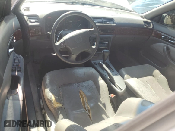 1997 Acura CL Premium z VIN 19UYA2256VL013735, wystawiony jako Copart lot #55453395 z przebiegiem 181 929 mil mil oraz Szkoda całkowita • Salvage title. Historia ofert i sprzedaży dostępna na DreamBid. Obrazek 8.