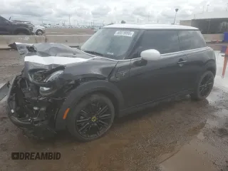 2023 MINI Hardtop Cooper SE with VIN WMW13DJ01P2U19472, listed as a Copart auction lot 59630715 with 7,304 mi miles and Salvage title. Bid and sale history available at DreamBid. Image 1.
