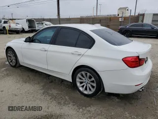 2013 BMW 3 Series 328i with VIN WBA3A5G57DNP23598, listed as a Copart auction lot 55677165 with 217,977 mi miles and Clean Title. Bid and sale history available at carsss.com. Image 2.