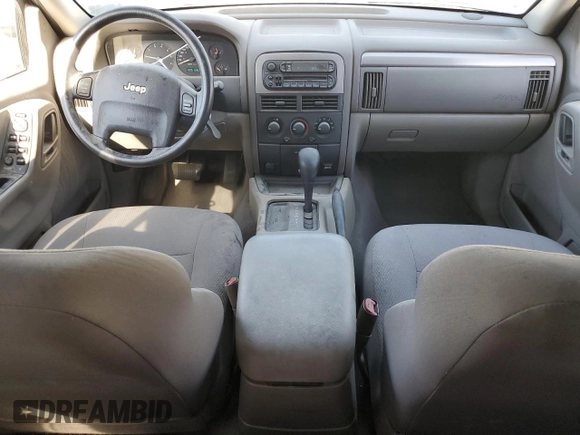 2002 Jeep Grand Cherokee Laredo with VIN 1J4GX48S52C265385, listed as a Copart auction lot 88823385 with 225,106 mi miles and Clean title. Bid and sale history available at DreamBid. Image 8.