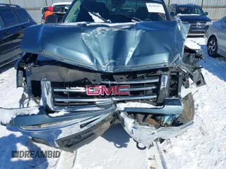 2012 GMC Sierra 1500 SLE z VIN 1GTR2VE72CZ103621, wystawiony jako IAAI lot #41565417 z przebiegiem 143 237 mil mil oraz . Historia ofert i sprzedaży dostępna na DreamBid. Obrazek 6.