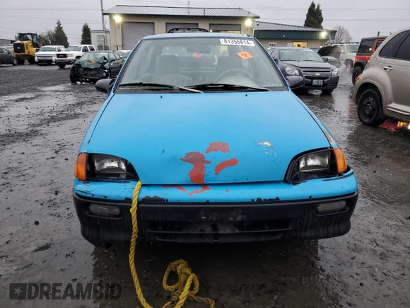 1992 Geo Metro z VIN 2C1MR2467N6724779, wystawiony jako Copart lot #81355814 z przebiegiem 85 587 mil mil oraz Szkody całkowita. Historia ofert i sprzedaży dostępna na DreamBid. Obrazek 5.