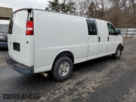 2013 Chevrolet Express Cargo Van with VIN 1GCWGGCAXD1156632, listed as a Copart auction lot 42946155 with 293,180 mi miles and Clean Title. Bid and sale history available at carsss.com. Image 3.