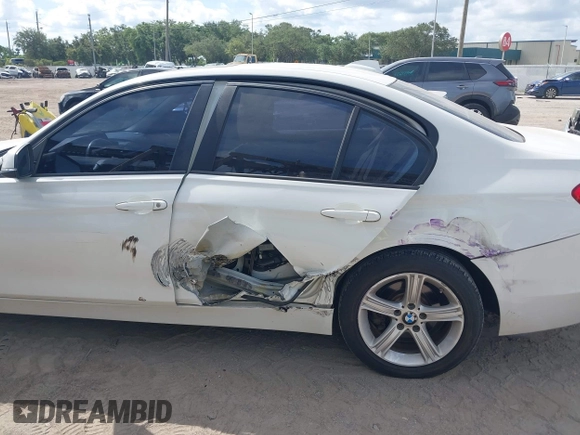 2015 BMW 3 Series 320i xDrive with VIN WBA3C3C58FK201748, listed as a IAAI auction lot 42678404 with 115,043 mi miles and . Bid and sale history available at DreamBid. Image 6.