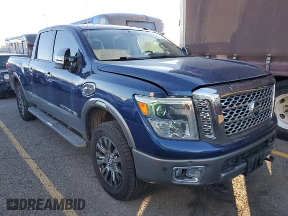 2016 Nissan Titan Platinum Reserve z VIN 1N6BA1F47GN502505, wystawiony jako IAAI lot #42520972 z przebiegiem 104 949 mil mil oraz . Historia ofert i sprzedaży dostępna na DreamBid. Obrazek 14.