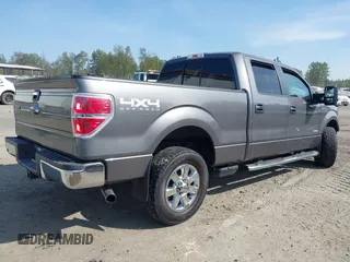 2014 Ford F-150 XL with VIN 1FTFW1ET5EFA77288, listed as a IAAI auction lot 42106634 with 74,582 mi miles. Bid and sale history available at carsss.com. Image 4.