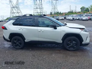 2021 Toyota RAV4 Hybrid XSE with VIN 4T3E6RFV9MU052563, listed as a IAAI auction lot 42295510 with 24,771 mi miles and . Bid and sale history available at DreamBid. Image 14.