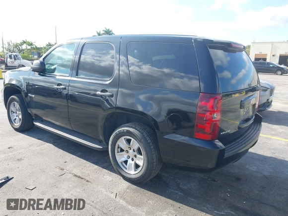 2013 Chevrolet Tahoe Commercial z VIN 1GNLC2E05DR218100, wystawiony jako IAAI lot #42182072 z przebiegiem 162 888 mil mil oraz . Historia ofert i sprzedaży dostępna na DreamBid. Obrazek 3.