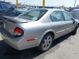 2001 Nissan Maxima GXE with VIN JN1CA31D41T815592, listed as a IAAI auction lot 42465005 with 96,822 mi miles and . Bid and sale history available at DreamBid. Image 4.