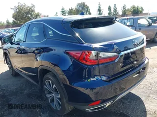 2022 Lexus RX with VIN 2T2HZMAA6NC253324, listed as a IAAI auction lot 36137292 with 6,266 mi miles. Bid and sale history available at carsss.com. Image 3.
