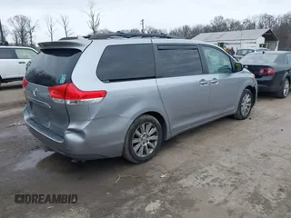 2012 Toyota Sienna XLE with VIN 5TDDK3DC7CS037579, listed as a IAAI auction lot 41080620 with 158,843 mi miles. Bid and sale history available at carsss.com. Image 4.