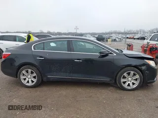 2013 Buick LaCrosse Premium 1 z VIN 1G4GF5E37DF174904, wystawiony jako IAAI lot #41544879 z przebiegiem 157 979 mil mil oraz . Historia ofert i sprzedaży dostępna na DreamBid. Obrazek 13.