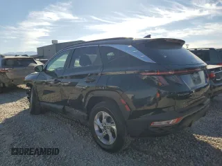 2022 Hyundai Tucson SEL with VIN 5NMJBCAE5NH030189, listed as a Copart auction lot 75327374 with 33,864 mi miles and Salvage Title. Bid and sale history available at DreamBid. Image 2.