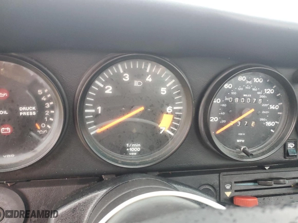 1986 Porsche 911 with VIN WP0EB0917GS161455, listed as a Copart auction lot 74672764 with 80,076 mi miles and Salvage Title. Bid and sale history available at carsss.com. Image 9.