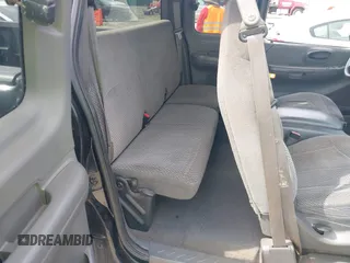 2000 Ford F-150 XL with VIN 1FTZX0725YKA09559, listed as a IAAI auction lot 41810954 with Not provided miles and . Bid and sale history available at DreamBid. Image 8.