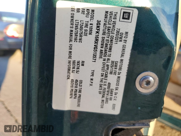 1997 GMC Suburban with VIN 3GKFK16RXVG513571, listed as a Copart auction lot 82086924 with 190,142 mi miles and Salvage title. Bid and sale history available at DreamBid. Image 12.
