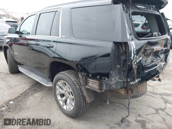 2015 GMC Yukon SLT with VIN 1GKS1BKC3FR129173, listed as a IAAI auction lot 41795585 with 97,893 mi miles. Bid and sale history available at carsss.com. Image 3.
