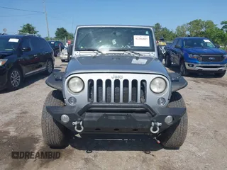 2014 Jeep Wrangler Sport with VIN 1C4AJWAG0EL126459, listed as a IAAI auction lot 42286803 with 179,025 mi miles and . Bid and sale history available at DreamBid. Image 12.