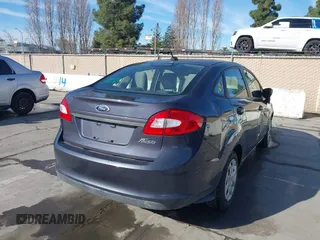 2012 Ford Fiesta S with VIN 3FADP4AJXCM187721, listed as a IAAI auction lot 41269984 with 118,474 mi miles. Bid and sale history available at carsss.com. Image 4.