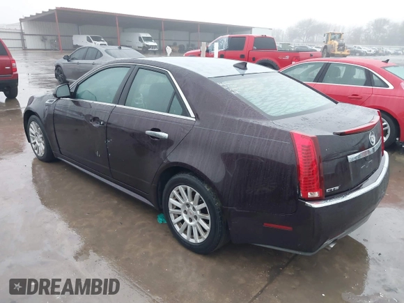 2010 Cadillac CTS Luxury with VIN 1G6DE5EG7A0123935, listed as a IAAI auction lot 41380563 with 182,671 mi miles. Bid and sale history available at carsss.com. Image 3.