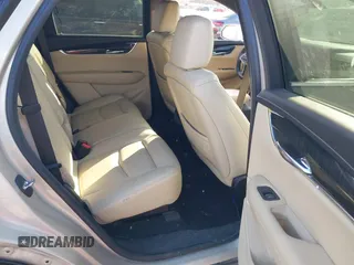 2017 Cadillac XT5 FWD with VIN 1GYKNARS0HZ174625, listed as a IAAI auction lot 41520634 with 116,169 mi miles. Bid and sale history available at carsss.com. Image 8.
