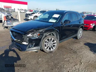 2020 Mazda CX-5 Grand Touring with VIN JM3KFBDM0L0790508, listed as a IAAI auction lot 41883319 with 114,398 mi miles and . Bid and sale history available at carsss.com. Image 20.