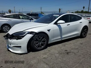 2023 Tesla Model S с VIN 5YJSA1E58PF500032, выставлен на аукционе Copart как лот 57532955 с пробегом Не указан миль и Списание • Salvage title. История ставок и продаж доступна на DreamBid. Изображение 1.