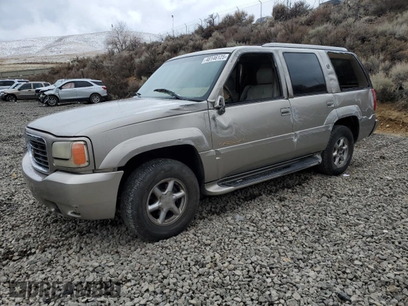 2000 Cadillac Escalade z VIN 1GYEK13RXYR103671, wystawiony jako Copart lot #48146125 z przebiegiem 271 195 mil mil oraz Szkoda całkowita • Salvage title. Historia ofert i sprzedaży dostępna na DreamBid. Obrazek 1.
