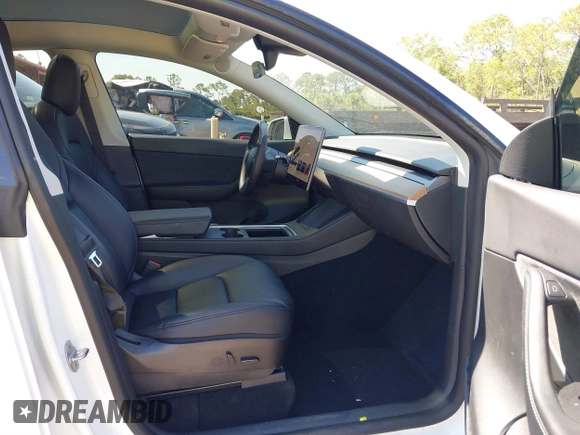 2022 Tesla Model Y Long Range with VIN 7SAYGAEE8NF431786, listed as a IAAI auction lot 41750353 with 67,846 mi miles and . Bid and sale history available at carsss.com. Image 5.